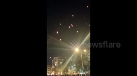 57 lanterns light up in sky in tribute to Greece train crash victims