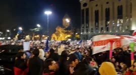 People send cheers to the Georgian fighters in Ukraine during protest in Tbilisi, Georgia