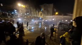 Water cannons and fireworks are used during protest in Tbilisi, Georgia