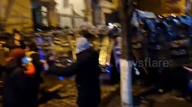 People face the police at the protest in Tbilisi, Georgia