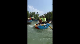 Vietnamese tourists experience the spectacular basket boat dance