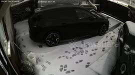 Homeowner's car slowly slides down drive as snow melts in West Yorkshire