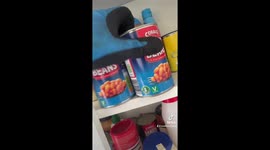 Food for clean windows: Local window cleaner in Merseyside helps himself to cupboards uninvited inside customer's home