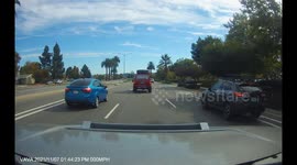 sitting in traffic in an intersection car crashes a tesla while crossing