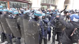 Chaos as Paris riot police charge pension protesters, smashing them with batons