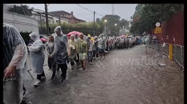 Coldplay fans brave torrential rain to see their idols in Sao Paulo, Brazil