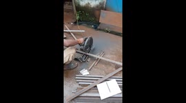 Iron Rod Cutting, Fireworks with Machine Cutting Man is cutting iron road with help of iron cutter machine with golden sparkling come out of it