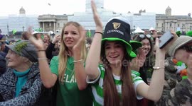 Happy, I say. You say, St. Patrick's Day in Trafalgar Square, London, UK