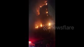 Dramatic footage shows Karachi tower block in flames