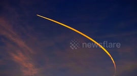 Plane trails look like someone zipping open the sky