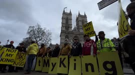 Protesters hold 'Not My King' signs outside Westminster Abbey on Commonwealth Day