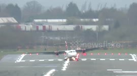 Abort! Abort! Pilot makes last second decision to avoid disaster landing at Birmingham Airport during gale-force crosswinds
