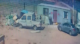 Strong winds blow over makeshift toilet while man was using it at Chinese car park