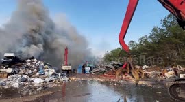 Firefighters Battle Blaze At Scrap Metal Yard In Charlotte, NC, USA