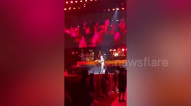 Harry Styles dodges bracelet hurled at him during concert