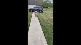 'I think they love her' - Kids' hearts spring with joy after being surprised with a Goldendoodle