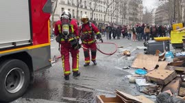 Firefighters at the protest against pension reform in Paris, France