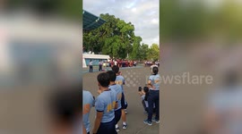 Lively policemen race in high heels for International Women's Day