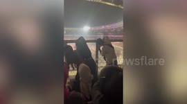 Blackpink K-Pop fans help each other wipe dirty windows restricting view at concert