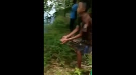 Boy left in tears as crab pinches him whilst he poses for pictures
