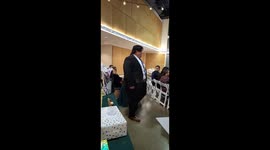 Embarrassing moment bride's cousin slips over during wedding aisle walk