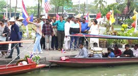 Indian tourists are happy to take a rowing boat at the Pattaya Floating Market.
