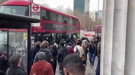 Commuters cram onto buses as London travel hindered by tube strikes