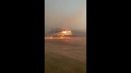 Chinese farmer flies a helicopter loaded with fireworks to celebrate Chinese New Year