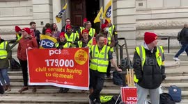 Public service workers protest outside the Treasury on day of mass strikes in UK