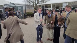 Punters enjoy a boogie during Ladies' Day at Cheltenham Festival