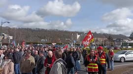 People hold a protest against pension reform in Pont Audemer, France
