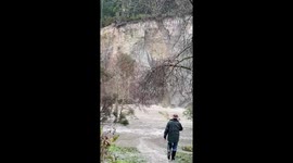 Dramatic moment cliff collapse causes mini-tsunami in Northern California river