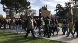 French pension protesters light trash cans on fire