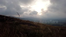 in the Peak District on MAM TOR camping watching the sunrise over castleton with a timelapse