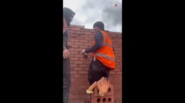 Bricklayers pull a hilarious 'Groundhog Day' prank on their co-worker