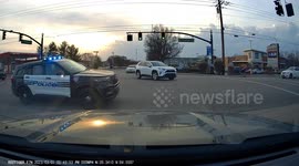 Instant Karma: Red SUV Runs Red Light and is Busted by Cops