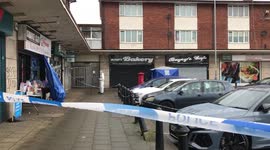 Man dies outside shops after being 'attacked with hammer during daylight robbery for his Rolex'