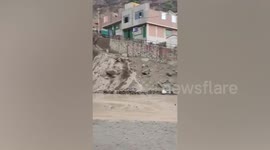 Peru mudslide pours down hillside washing away a rickshaw