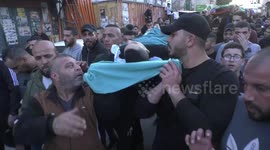 Mourners carry the bodies of Palestinians killed in an Israeli raid earlier in the day, during their funeral in Jenin city in the West Bank.