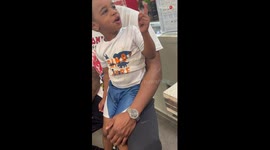 Kid's over-the-top reaction to getting his ear pierced will make you spit your coffee out