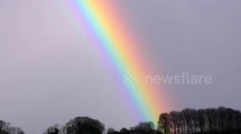 Beautiful bright rainbow appears over Wirksworth in the Derbyshire Dales - 4K editorial