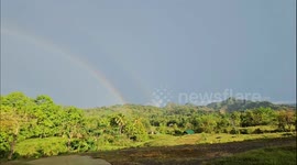 Rare double rainbow and a sunshower in Dumingag, Philippines