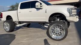 Customized Ford F250 parks in the middle of the parking lot so the owner can show off his new rig!!