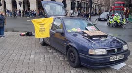 Anti ULEZ protesters protest against Sadiq Khan with a classic red route master bus