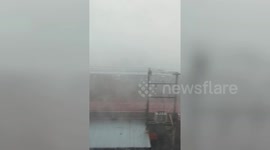 Hail storm rips roofs from buildings injuring 12 in northern Thailand
