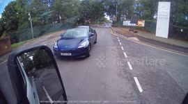 Cash for Crash Attempt aborted? Tesla driver causes confusion at junction and carries on straight while indicating to turn left. But then turns left?