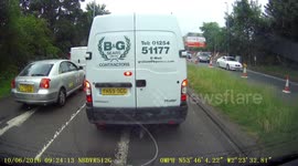 Road Rage Aggressive driving by 2 company vehicles competing for the same road space