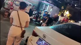 Chinese woman uses rope to hold man as a dog after winning live streaming competition