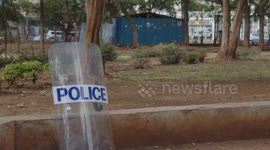 A Police sets down his shield awaiting protesters in Nairobi, Kenya 20th March, 2023