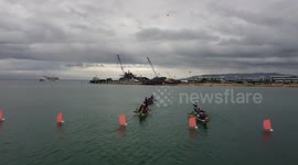 Rowers race on glow-in-the-dark dragon boats for Roman Catholic festival in the Philippines